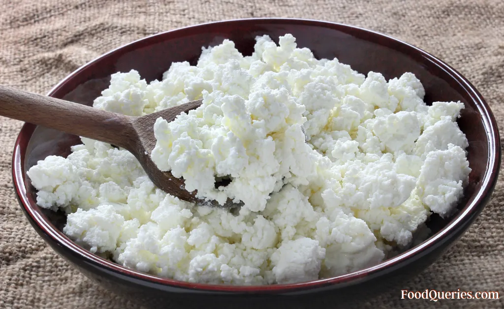 cottage cheese in the wooden pan