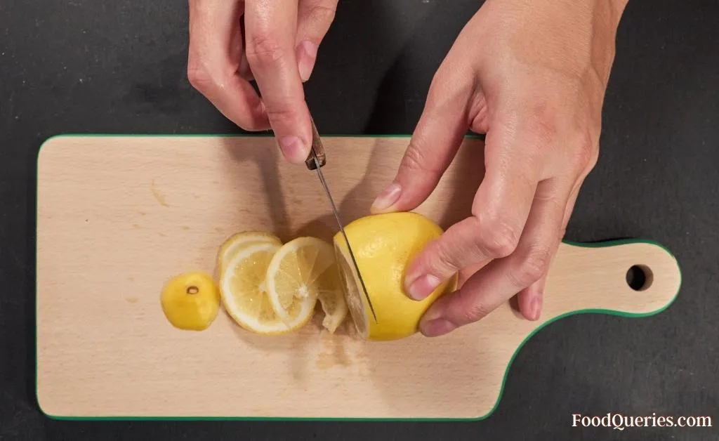 cutting lemons with knife