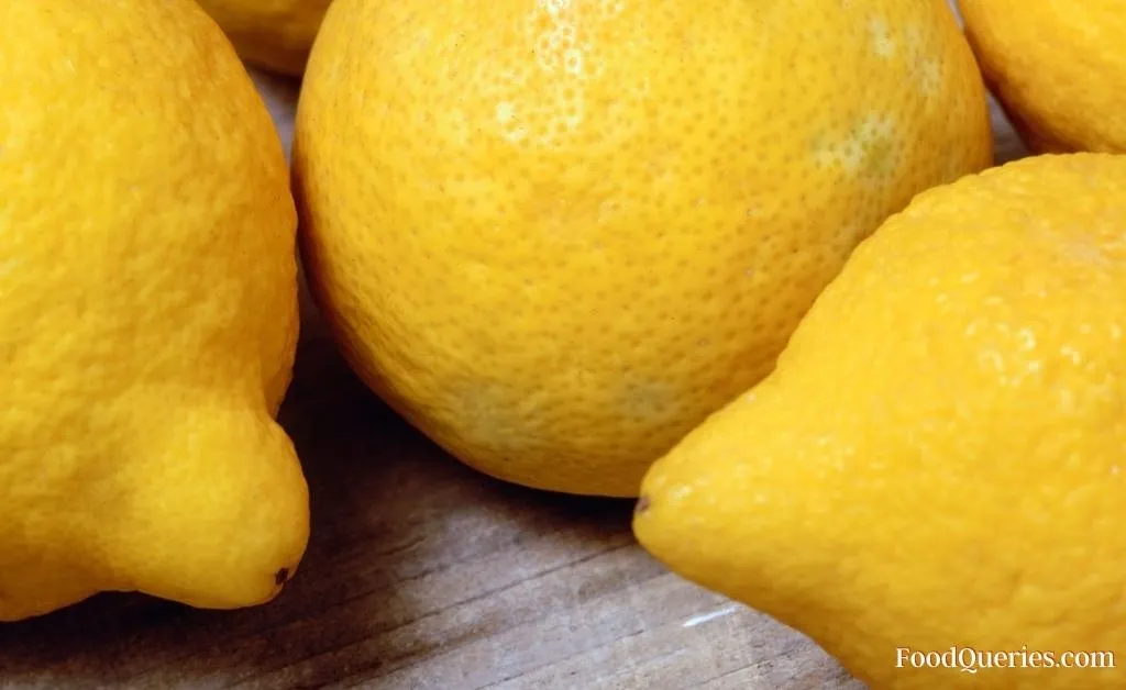 ripe lemons with yellow texture