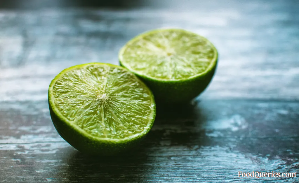 sliced green limes on the table