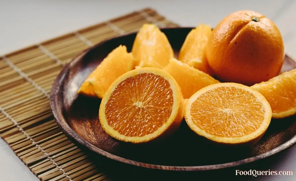 sliced oranges on a table